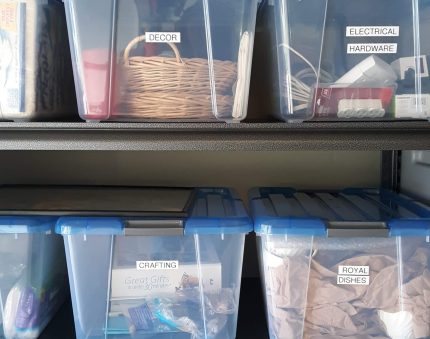 Garage with Clear Bins and Metal Shelves from Costco with labels by Bella Organizing Professional Home Organizers in Oakland and the San Francisco Bay Area