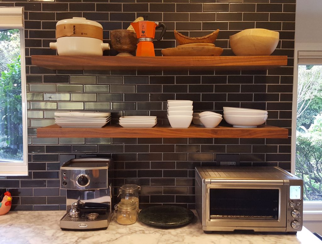 kitchen unpack and organize floating shelves hold dishes and decorations Bella Organizing Professional home organizers and residential packing and moving management company serving the San Francisco Bay Area.